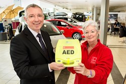 Bill Maclean, Finance Director, Macrae & Dick and Kathy McIlwaine, Local Fundraising Volunteer Manager at BHF Scotland