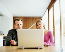 Couple avoiding online fraudsters