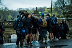 Event participants carry "team weight" throughout the GORUCK challenge.