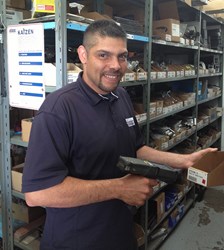 Jason Farley, Trailer Wizards' Parts Manager (Québec Region), checks inventory in Montréal's Parts Department.