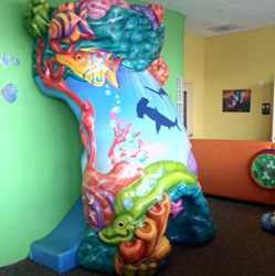 Kids Little Smiles dental clinics offer indoor playgrounds to attract customers and entertain patients.