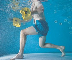 aquatic therapy with dumbbells