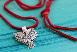 sterling silver with red leather cord