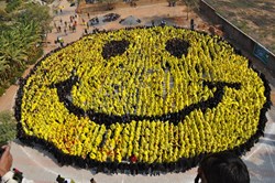 Men In Kilts will attempt to break the World Record for 'Largest Human Smiley' seen here held by India with 3,737 people