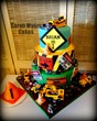Myer's construction cake featuring signs with edible images.