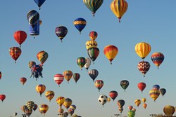 Hundreds of balloons dot the sky over Albuquerque during the Albuquerque International Balloon Fiesta. Photo by Raymond Watt