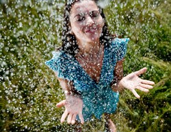 Woman Standing in Rain