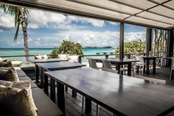 Retractable beach front restaurant deck cover for Coco Maya Restaurant