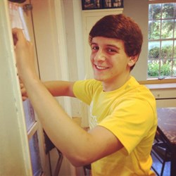 World House for Social Justice student Gregg Simmons works on a service project in the community