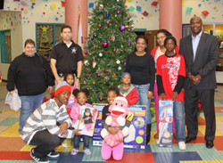 Families receive early Christmas gifts from the University Area CDC