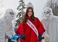 National Cherry Queen Meg Howard with two abominable Suttons Bay friends