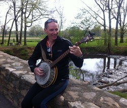 Col. John Sims and his banjo.