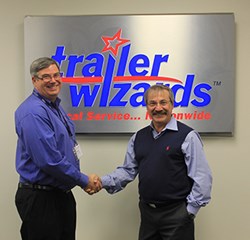 Doug Vanderspek, President of Trailer Wizards, and Tibor Varga, President of Max-Atlas Equipment International Inc., announce a dealership partnership.