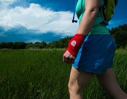 Trail Runner with a Dr. Cool Recovery-On-The-Go Wrap