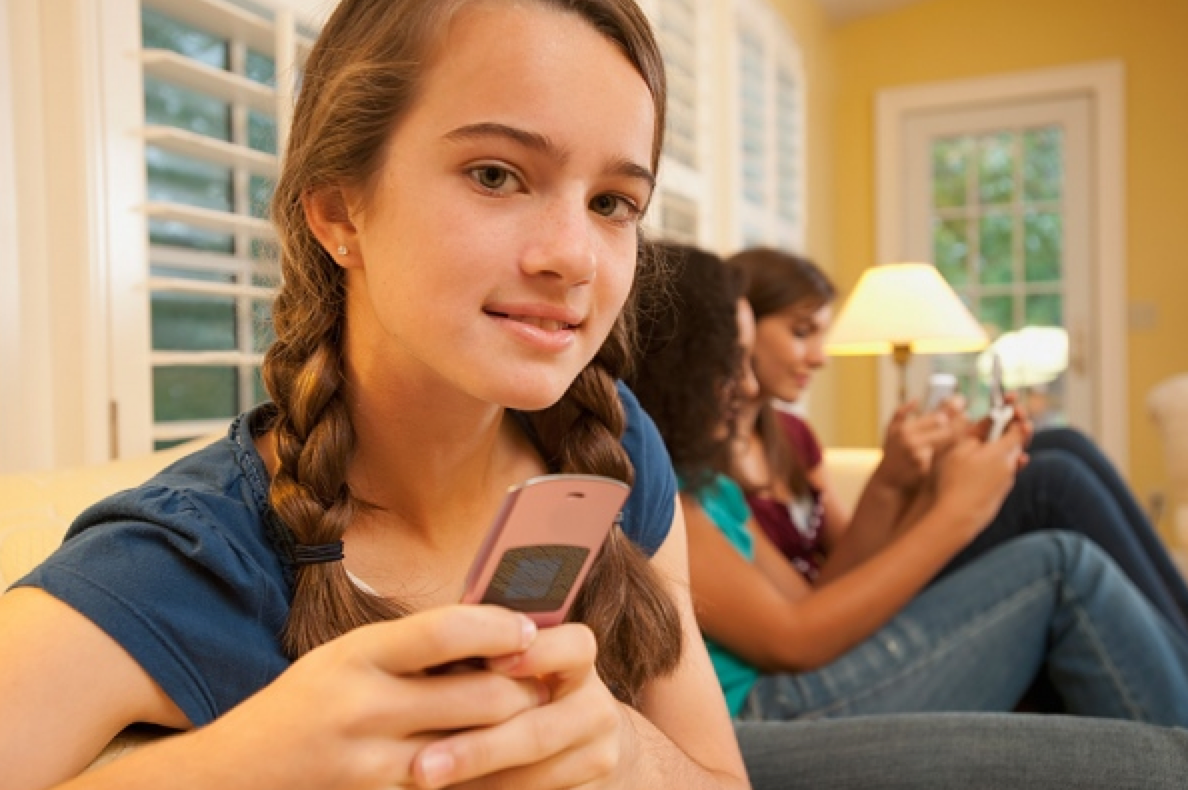 Teen Girl With Phone