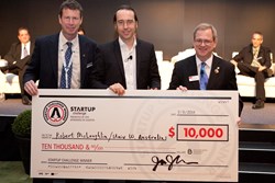 Jay Kumler of Jenoptik (at left) and SPIE President Philip Stahl (right) congratulate 2014 Startup Challenge first-place winner Robert McLaughlin of the University of Western Australia. (Photo: Joey Cobbs for SPIE.)