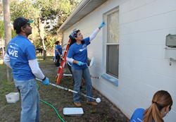 WellCare employees, family and friends help revitalize the homes of two East Tampa women as part of Habitat for Humanity of Hillsborough County, Inc.’s “A Brush with Kindness” event on March 1.