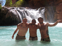 Residents swim in Havasu Falls after a ten mile hike to camp grounds.
