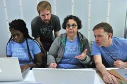 Tech Talent South cofounder Richard Simms and students
