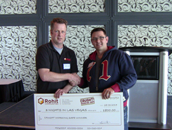 Sander Van Ingen (left) from Rohit Communities with winner Stephen Ewaskiw.