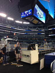 101 Mobility Dallas installing a commercial wheelchair platform lift at AT&T Stadium for the Final Four.