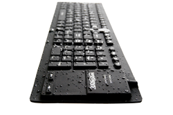 Wet washable keyboard (shown KBWKFC108T) drying after immersed in hospital-grade disinfecting agents or pressure washed with bleach solutions between batches of yogurt, cheese and dairy products.