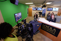 School of Mass Communication students work in a new multimedia newsroom.