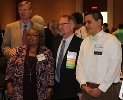 Pictured left to right are Bill Crowder (standing), Irma Patterson, CEO Craig Bass and Yussef Farag.