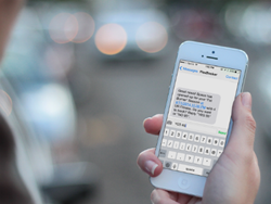 FlexBooker online booking customer receiving automated SMS text alert