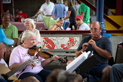 A photo of musicians performing