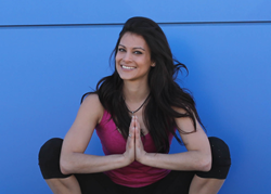 Model Christine Rahman wearing a gorgeous pink yoga tank by TerraFrog.