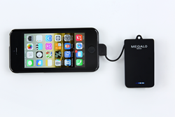 Megalo Mini charging an iPhone