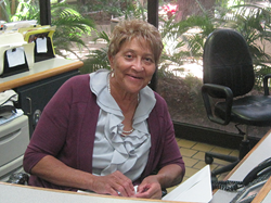 Photo of Sarah Smith-Small at her desk