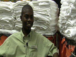 Photo of Lajarvis Smiley working in the laundry service department at the Hilton St. Petersburg Bayfront.