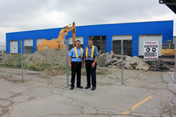 Joe Pannella and Michael Dann await the opening of the newly expanded Mississauga trailer service centre.