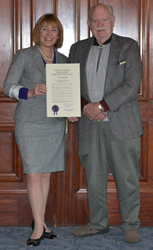 FIJA New Hampshire state contact Dick Marple receives a 2013 Jury Appreciation Day proclamation from Governor Maggie Wood Hassan.