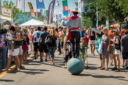Streets lined with food+ artisan booths, Festival Italiano featured live music + strolling performers (pictured)