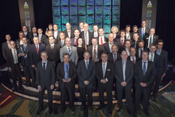Winners and presenters commemorate the night with a group photo after the 2014 Prism Awards for Photonics Innovation, at the close of a gala banquet.