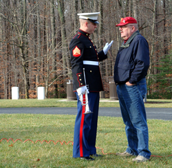 Stan Clark talks with an Honor Guard.