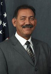Commissioner Estevan López