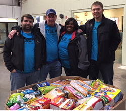 Team members from TQL's Mobile office give back at the Bay Area Food Bank