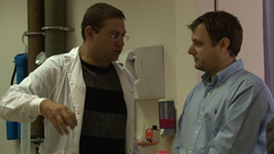 Prof. Amit Gefen (white lab coat) and the Executive Director of the Modern Agriculture Foundation Koby Barak (light blue shirt)
