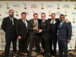 Unlimi-Tech accepts Emmy Award during reception at Consumer...