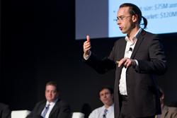 Robert McLaughlin of the University of Western Australia, winner of the 2014 SPIE Startup Challenge, makes his pitch during SPIE Photonics West.