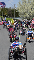 Cyclists complete the 2014 Face of America ride.
