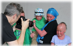 Rick Guidotti of Positive Exposure photographs attendees at 2014 National Family Foundation for Ichthyosis and Relates Skin Types