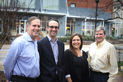 SIGNiX's leadership team poses in front of Warehouse Row, the location of its new office space