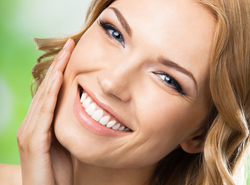 A woman with a beautifully white smile
