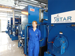 Sarah Patrick in front of Star Renewable Energy's heat pump in Drammen
