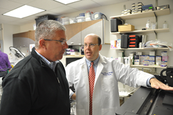Sean Barnett, MD, MS, FACS, FAAP, Chief Medical Officer at Kaleidoscope and President and Medical Director of Ascend, discusses product design at the innovation center with Bryan Bucklew, President and CEO of Greater Dayton Area Hospital Association.